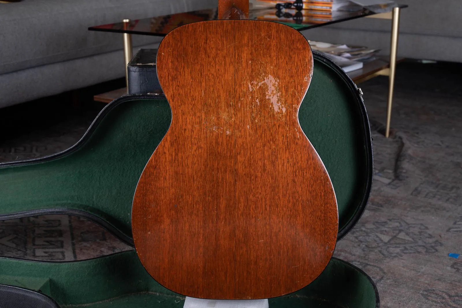 Mahogany back of the 1949 Martin 0-18 showing scratches and finish wear from years of playing
