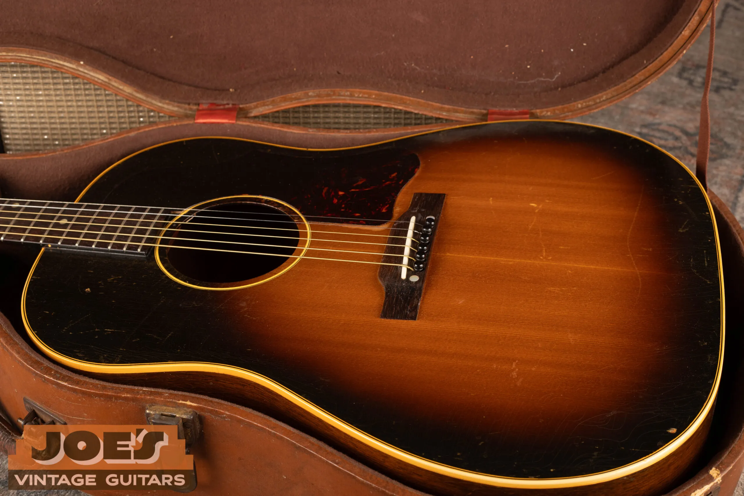1950s Gibson J-45 acoustic guitar in original case, vintage Gibson flat-top value and collectibility