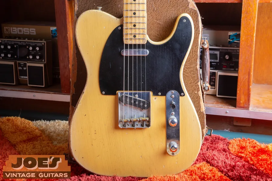1952 Fender Telecaster with blonde finish, black pickguard, maple neck, and brass saddles