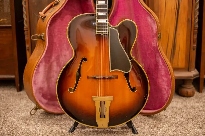 Full front of the sunburst 1954 Gibson L-5C with a rounded Venetian cutaway
