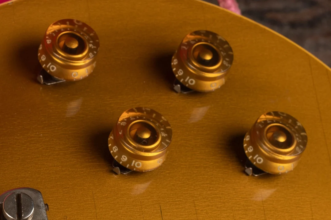 Four low gold speed knobs and pointer washers on a 1954 Gibson Les Paul Goldtop