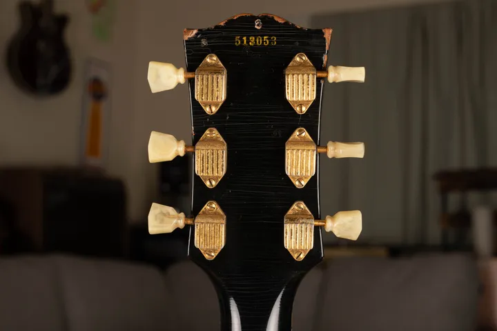 Six gold Kluson Waffleback tuners on a 1955 Gibson Les Paul Custom headstock
