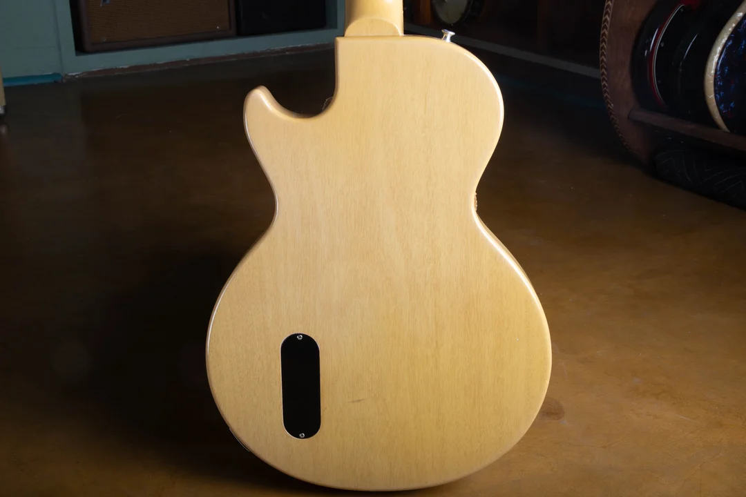 Back of a 1957 Les Paul TV Model showing mahogany grain through the pale finish