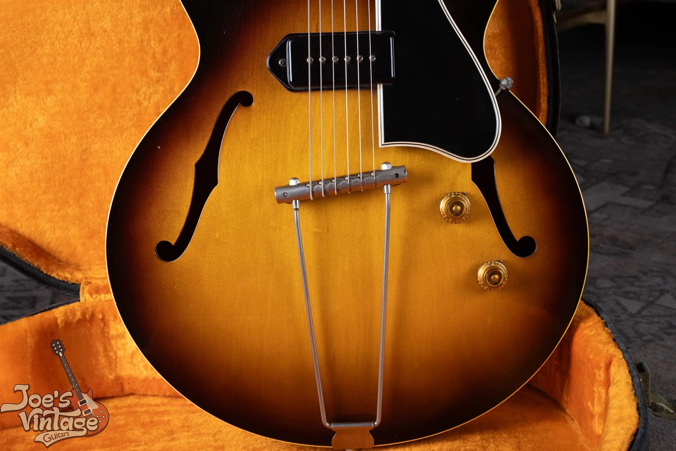Close view of 1958 Gibson ES-225T body, P-90, knobs, and long bridge tailpiece