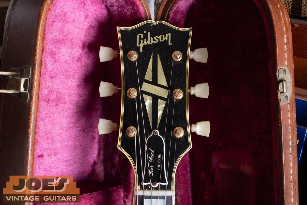 1958 Gibson Les Paul Custom headstock with slanted pearl block logo and separate i dot