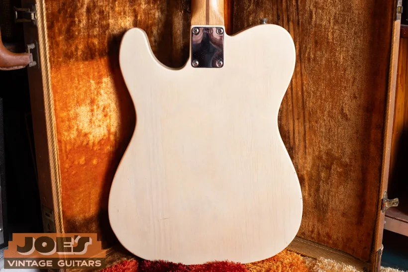 Back of a 1959 top-loading Fender Telecaster with no string ferrules through the body