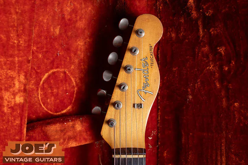 Maple headstock on the 1960 Fender Telecaster showing the Fender logo and tuners