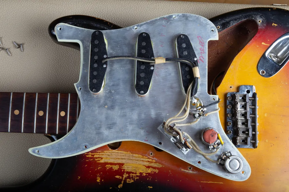 Original pickups, wiring, pots, and pickguard on a 1963 Fender Stratocaster