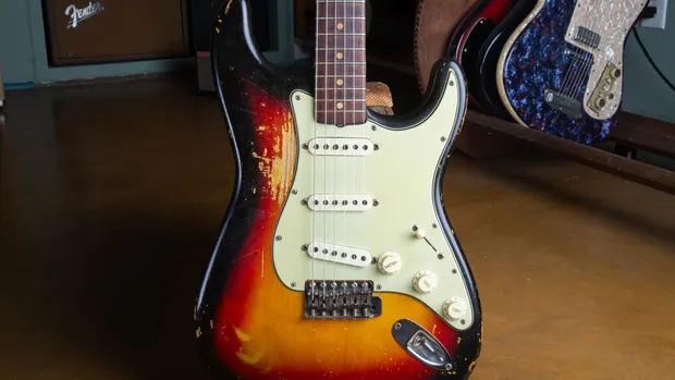 Heavily played 1963 Fender Stratocaster in three-color sunburst