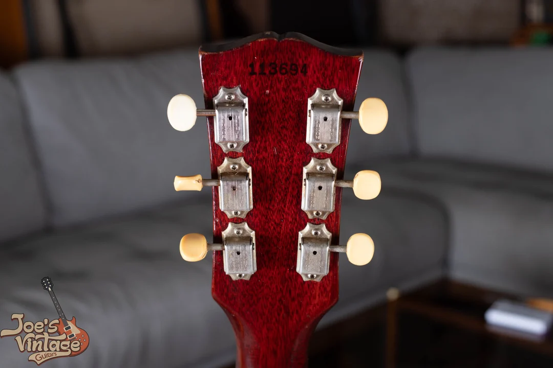 Six double-line Kluson Deluxe tuners under serial number 113694 on a vintage Gibson ES-335 headstock