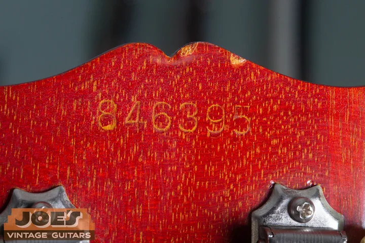 Close-up of impressed serial 846395 on a Gibson ES-335 headstock