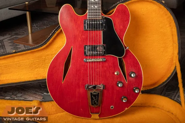 Vintage cherry Gibson thinline electric guitar