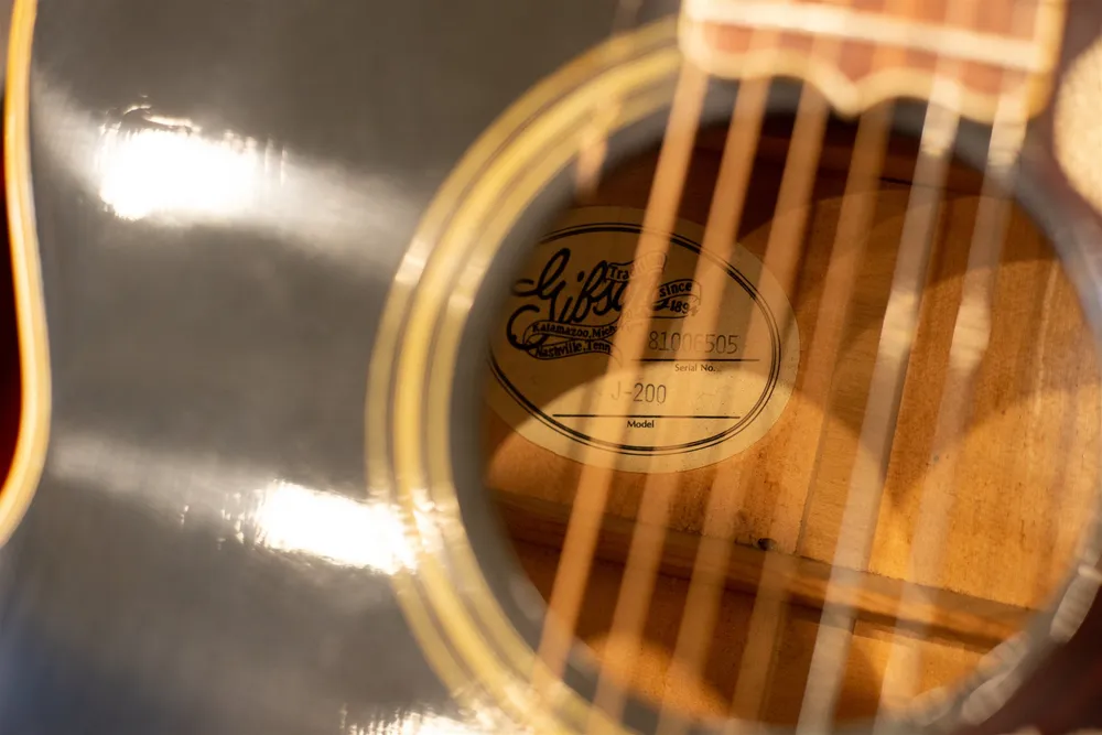 Kalamazoo-address J-200 label with serial 81006505 inside a Nashville-built 1986 Gibson