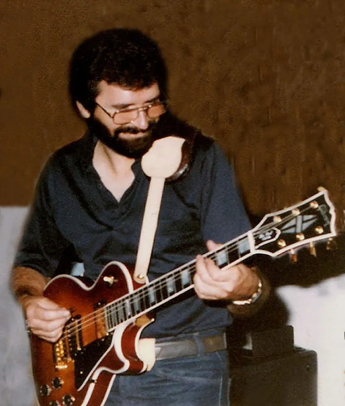 Dennis Hiatt as a young musician playing his cherry sunburst 1983 Gibson Les Paul Custom