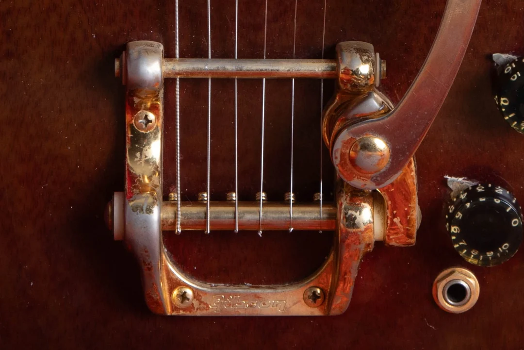 Gold Gibson-branded Bigsby on a 1972 SG Custom