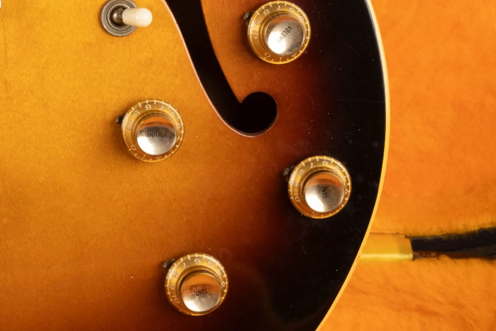 Gold reflector knobs on a 1960s Gibson ES-330, the metallic insert in the dome top can be either gold or silver