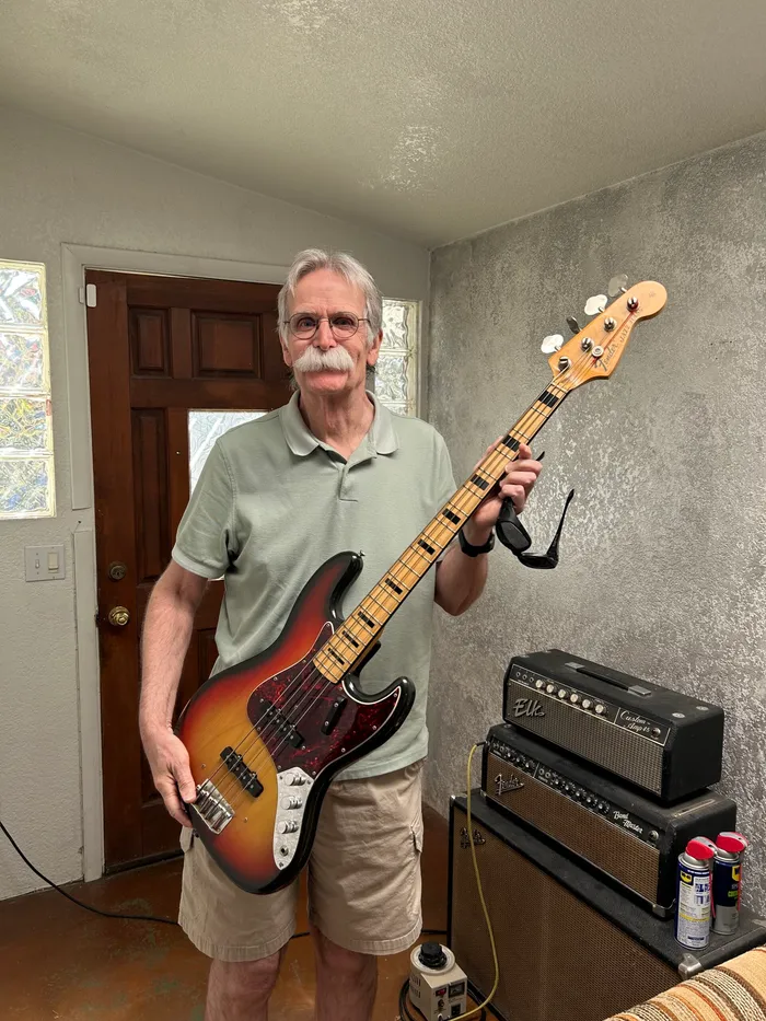 Jim with his 1973 Jazz bass which he has owner for over 40 years.