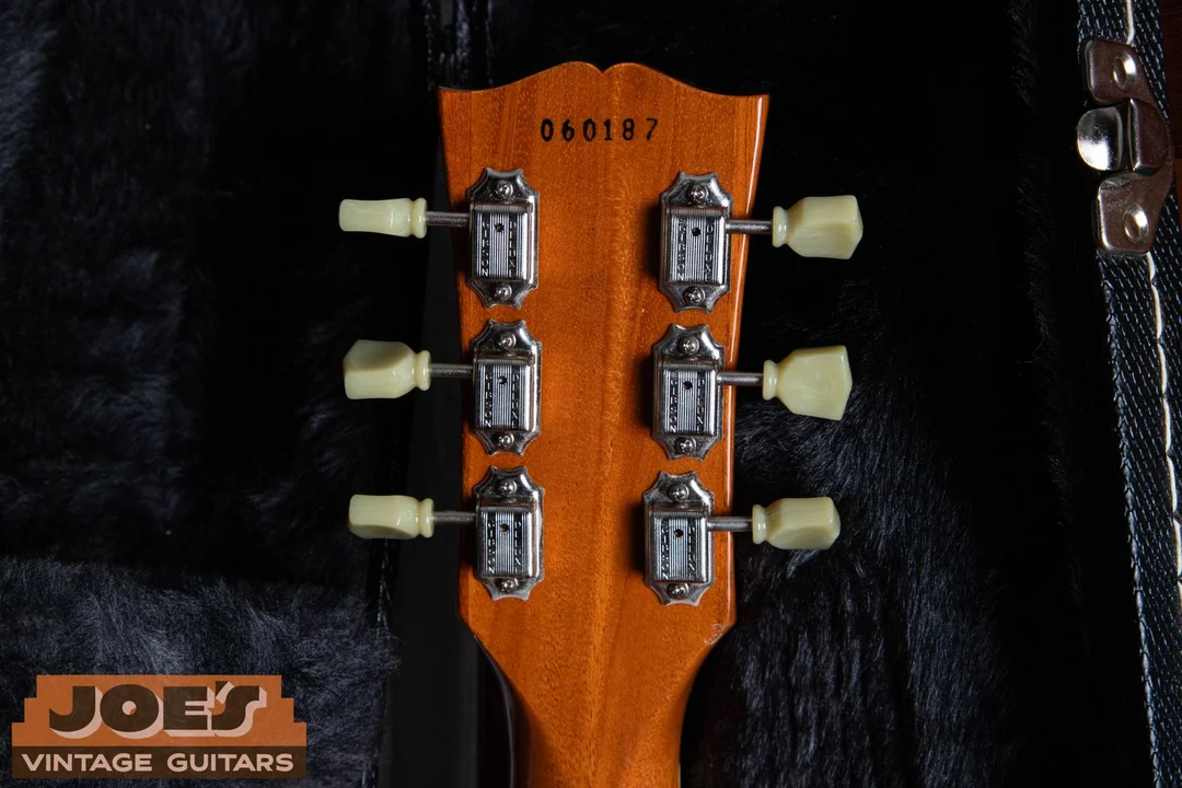Ink-stamped serial number on the back of a Gibson Les Paul Classic headstock