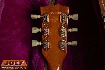 Gibson serial number pressed into the headstock wood