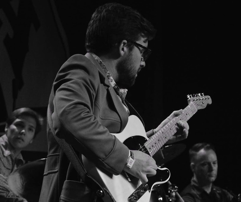 Joe Dampt playing guitar